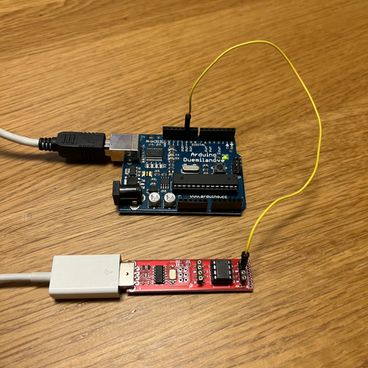 An Arduino connected to an ATtiny85 using a single wire